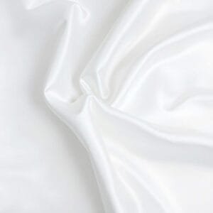 Luxury China Silk Fabric in various colors, ideal for garments and décor, available at SaadSalman.pk.