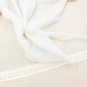 Luxury Sheesha Net Fabric with intricate mirror work, perfect for bridal wear and décor, available at SaadSalman.pk