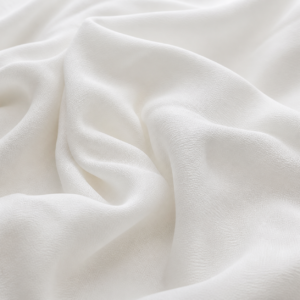 White crepe fabric in textured studio folds