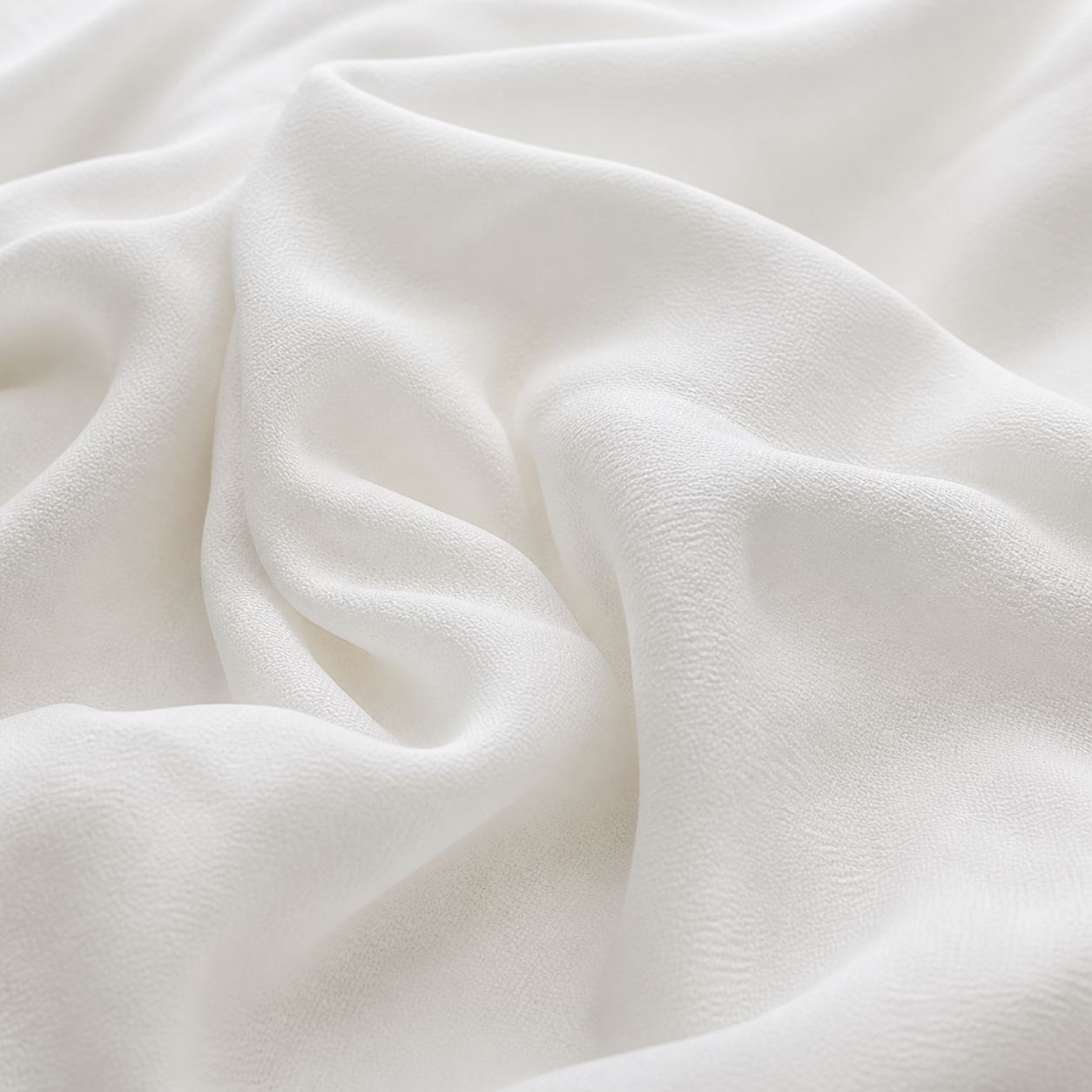 Saad Salman | Silk Fabric Manufacturer & Wholesaler White crepe fabric in textured studio folds