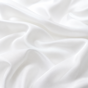 White ultra-light fabric in soft studio folds